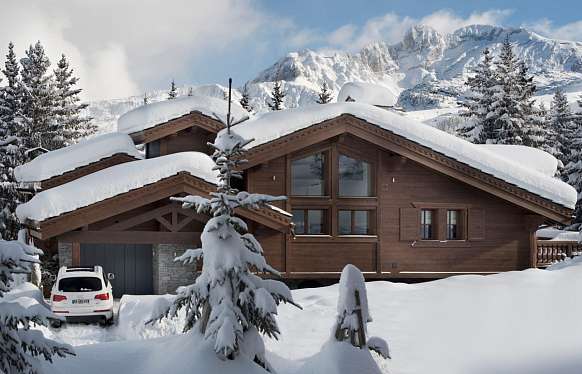 Chalet skis aux pieds de 6 chambres à louer en montagne à Courchevel 1850