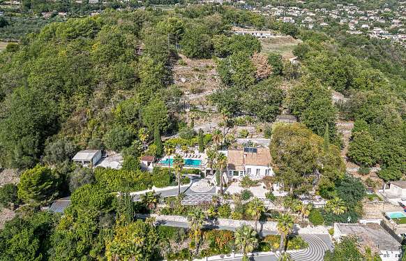 Elegant Estate with Panoramic Views and Private Tennis Court